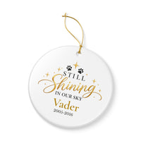Load image into Gallery viewer, Personalized cat memorial ornament in blue with Still Shining in Our Sky, name and years