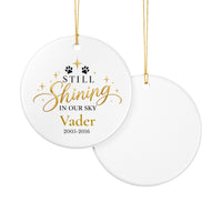 Load image into Gallery viewer, Personalized cat memorial ornament in blue with Still Shining in Our Sky, name and years