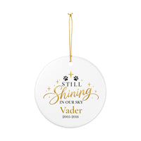 Load image into Gallery viewer, Personalized cat memorial ornament in blue with Still Shining in Our Sky, name and years