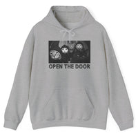 Load image into Gallery viewer, A light gray heather pullover hoodie featuring a black-and-white graphic print of three cats wearing masks with the text 'OPEN THE DOOR' underneath, displayed on a clean white background.
