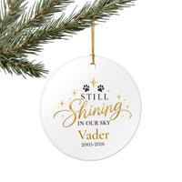 Load image into Gallery viewer, Personalized cat memorial ornament in blue with Still Shining in Our Sky, name and years