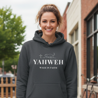 Load image into Gallery viewer, Woman wearing a gray hoodie with 'YAHWEH WALK IN FAITH' text on a sidewalk.